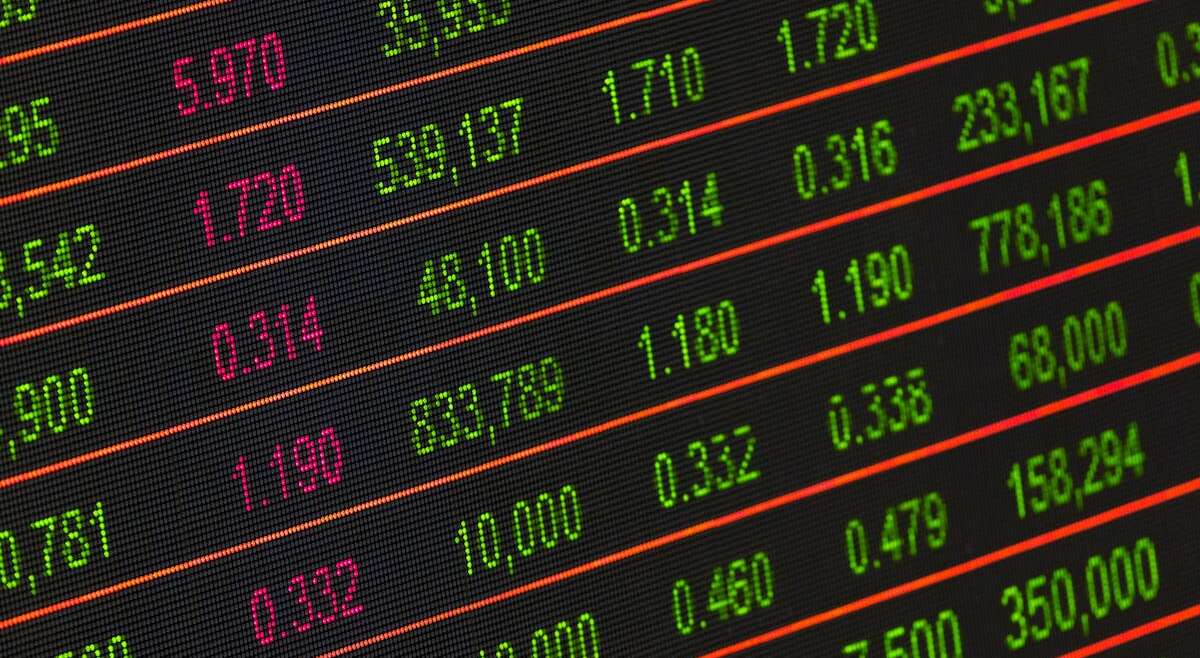 Global currency exchange rates board showing forex pairs