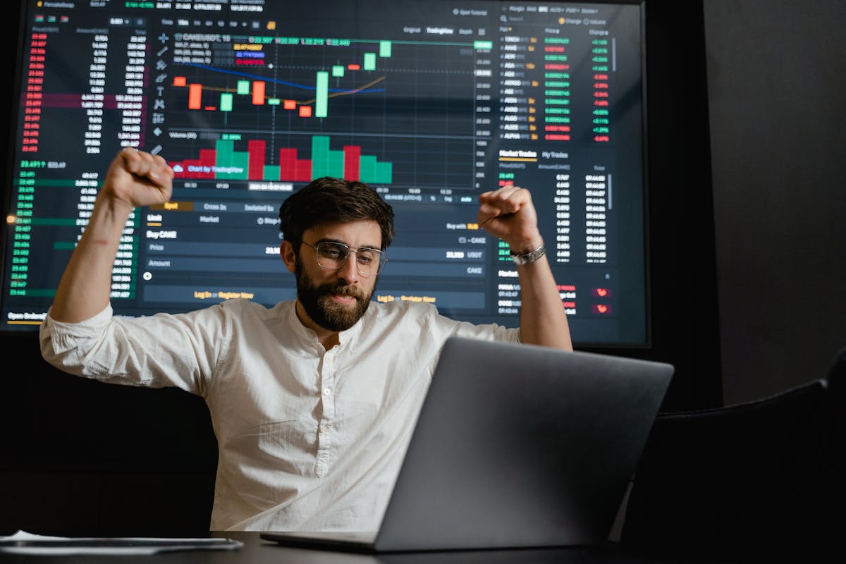 Trader analyzing risk management with stop-loss levels on screen