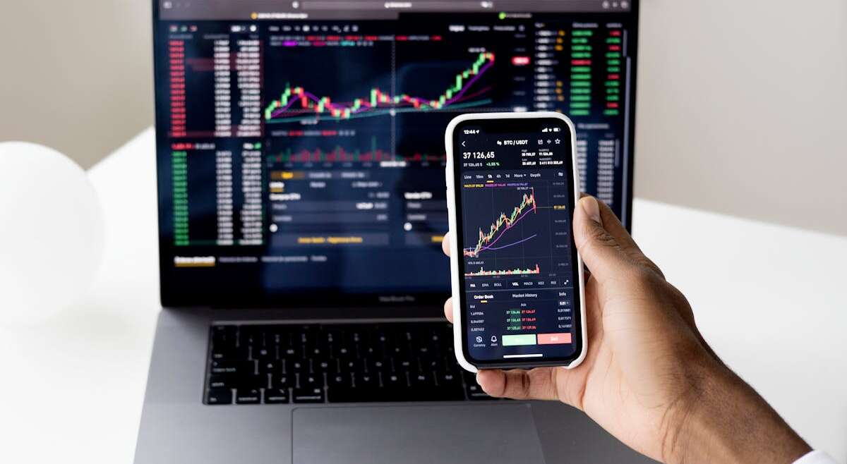 StockFusionAI 2026 review concept with stock market charts and AI technology